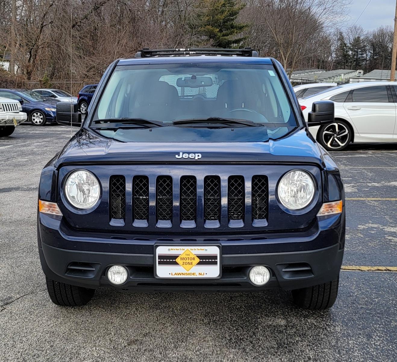 2015 Blue /Black Jeep Patriot Latitude (1C4NJRFB0FD) with an 4-Cyl, 2.4 Liter engine, Automatic transmission, located at 341 N White Horse Pike, Lawnside, NJ, 08045, (856) 262-9500, 39.855621, -75.027451 - Photo #5